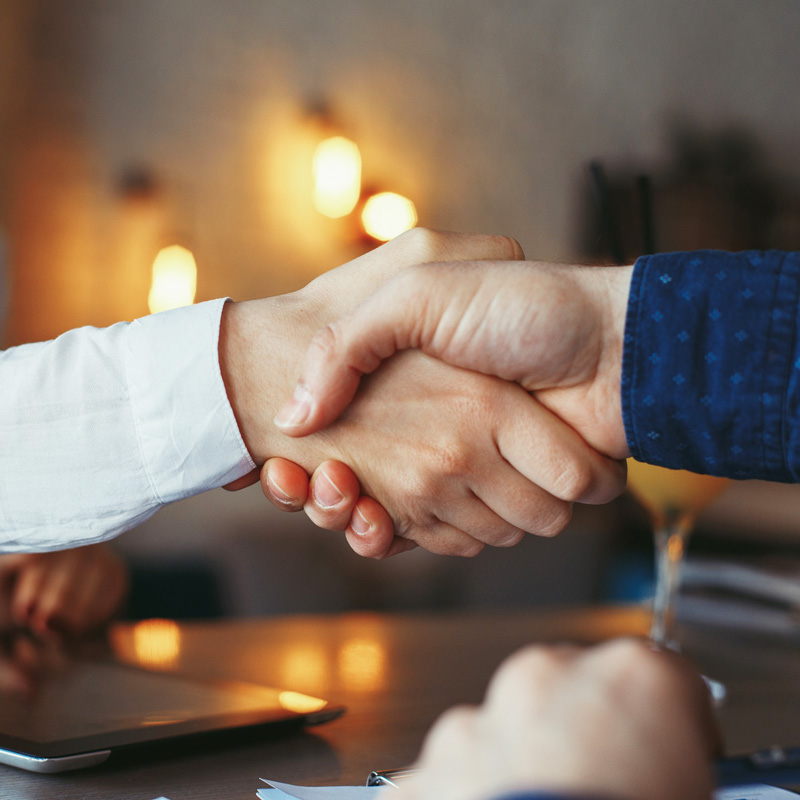 businessman-and-businesswoman-handshake-1